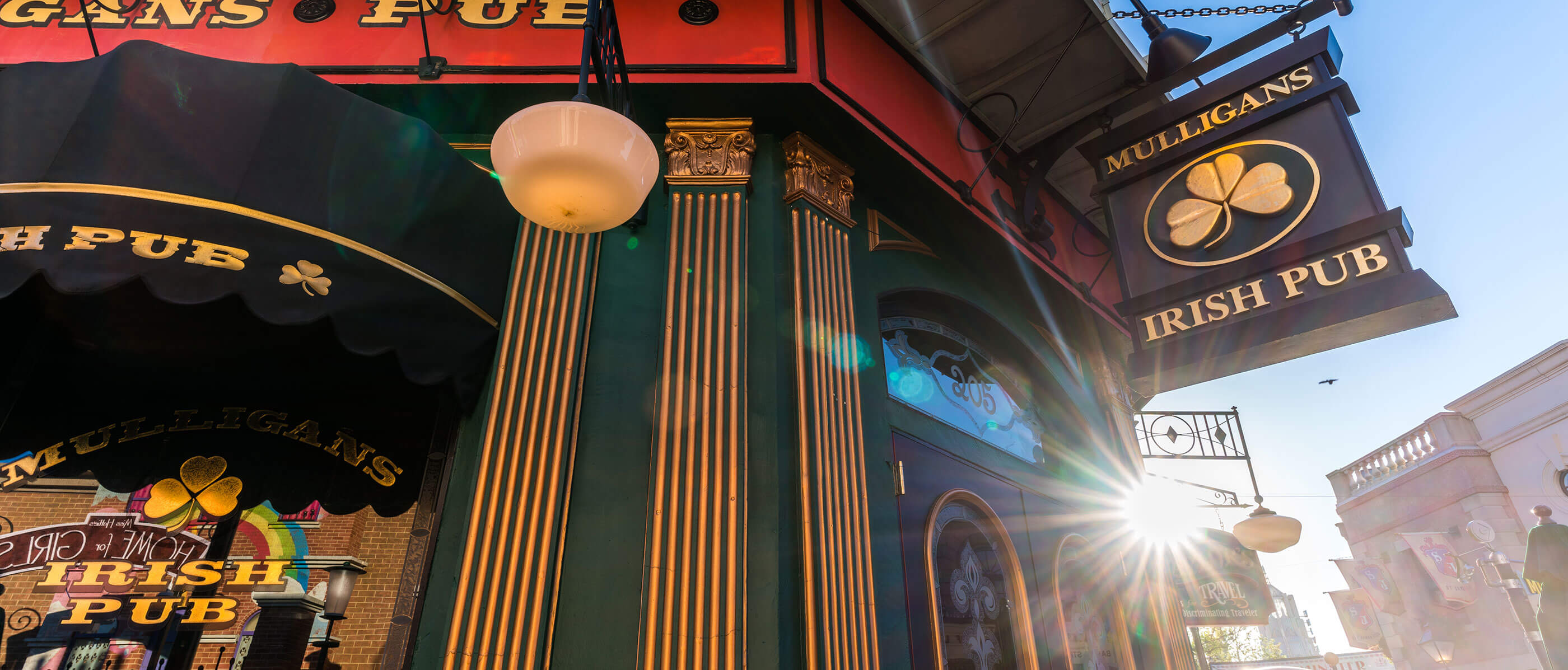 The outside of Mulligans pub on a sunny day.
