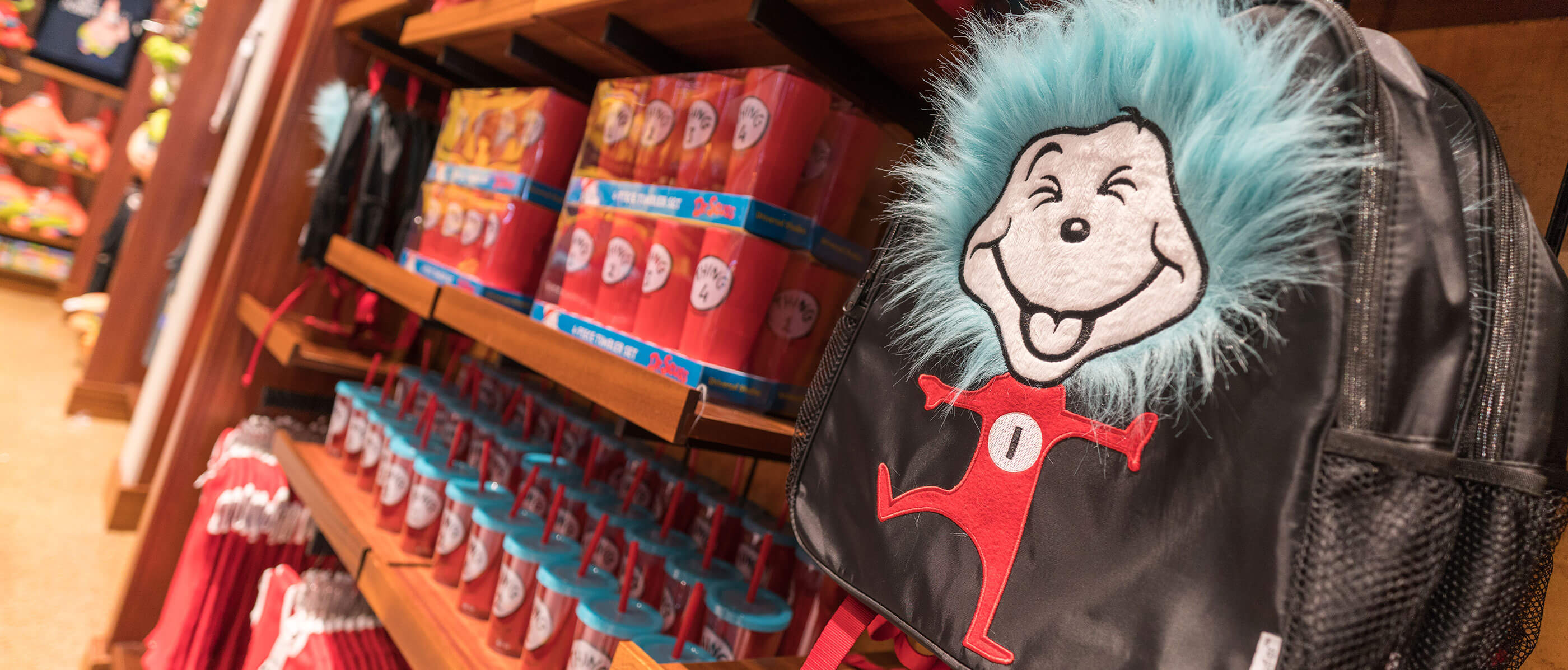 Store's wall full of merchandise of the character Thing 1.