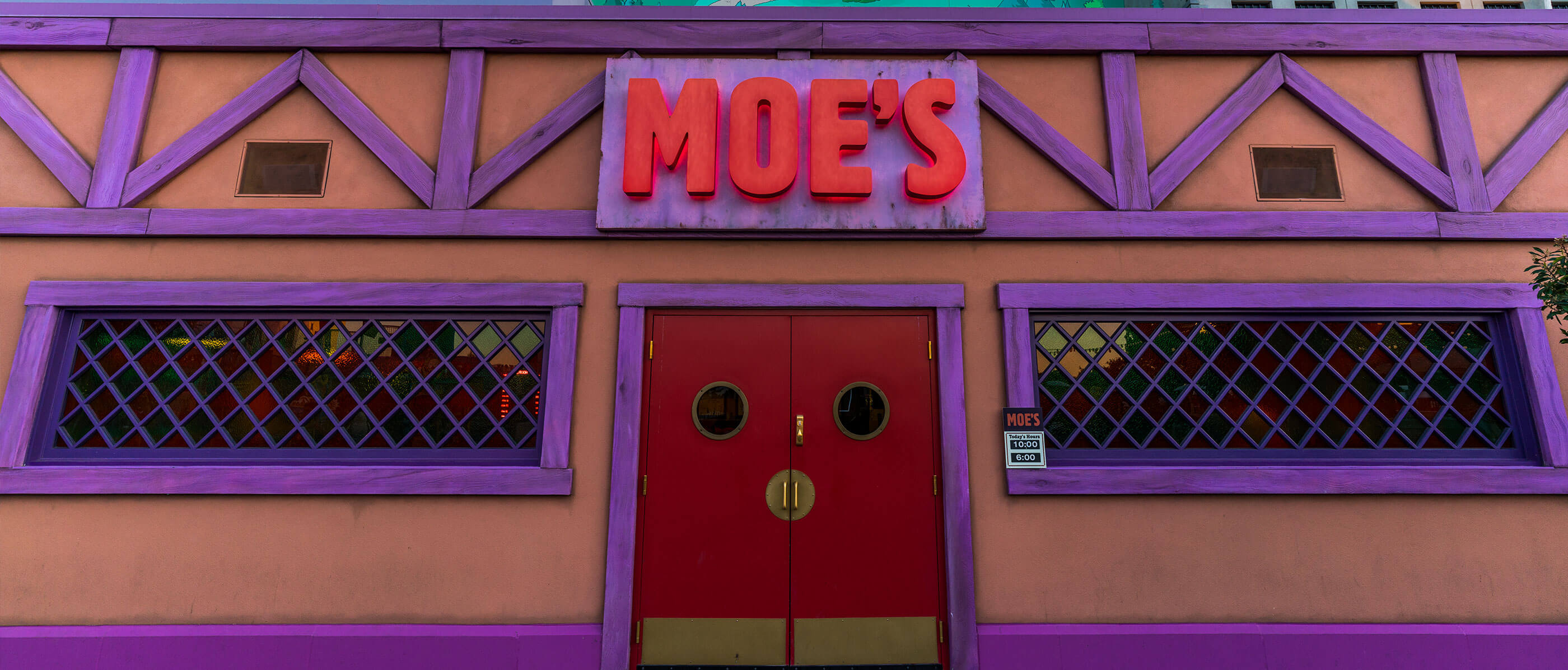 Moe's restaurant in purple and brown.