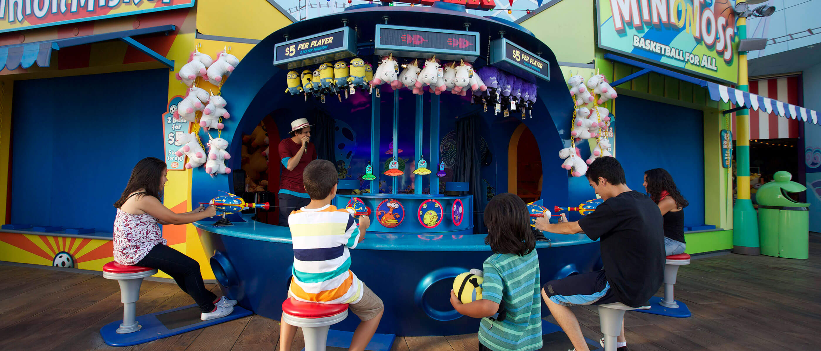 Kids playing a water gun game at Super Silly Fun Land.