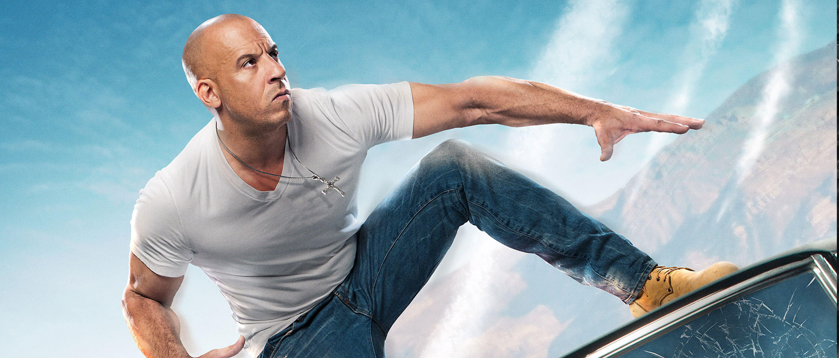 Vin Diesel on a roof of a car.