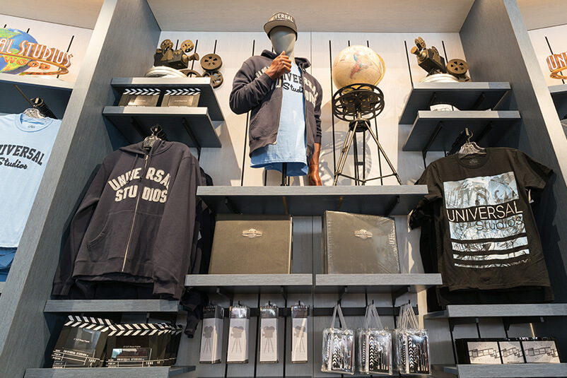 Wall full of Universal Studios merchandise.