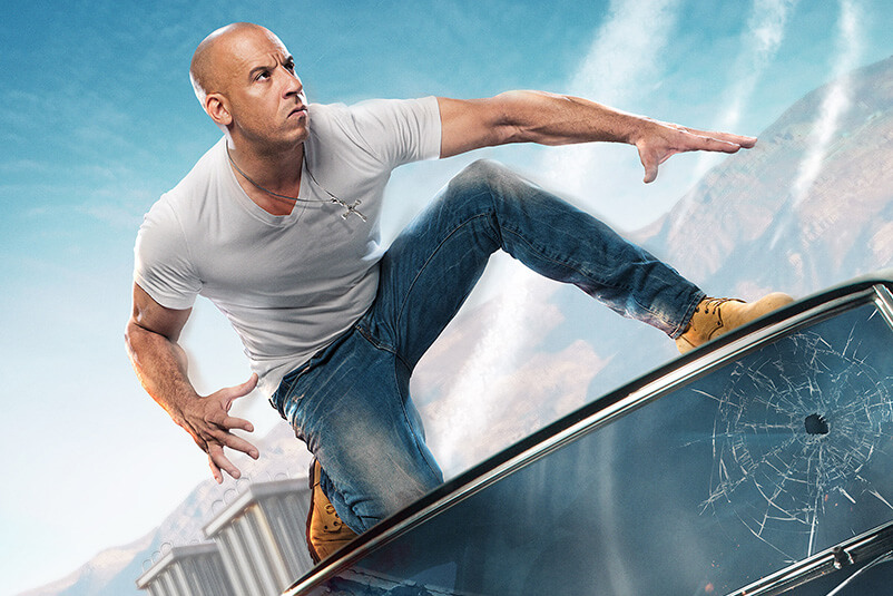 Vin Diesel on a roof of a car.