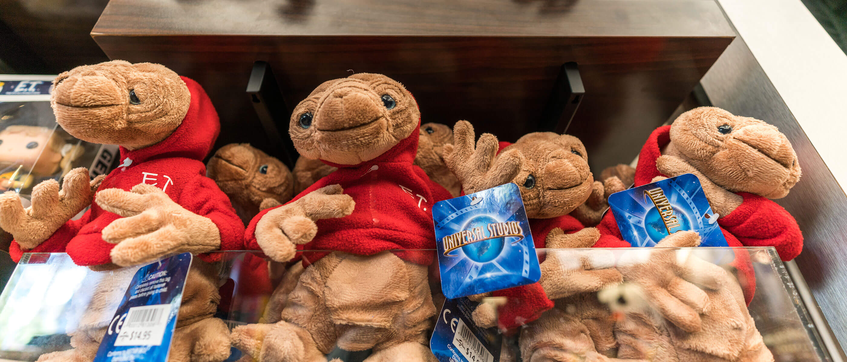 Stuffed ET toys with Universal Studios tags.