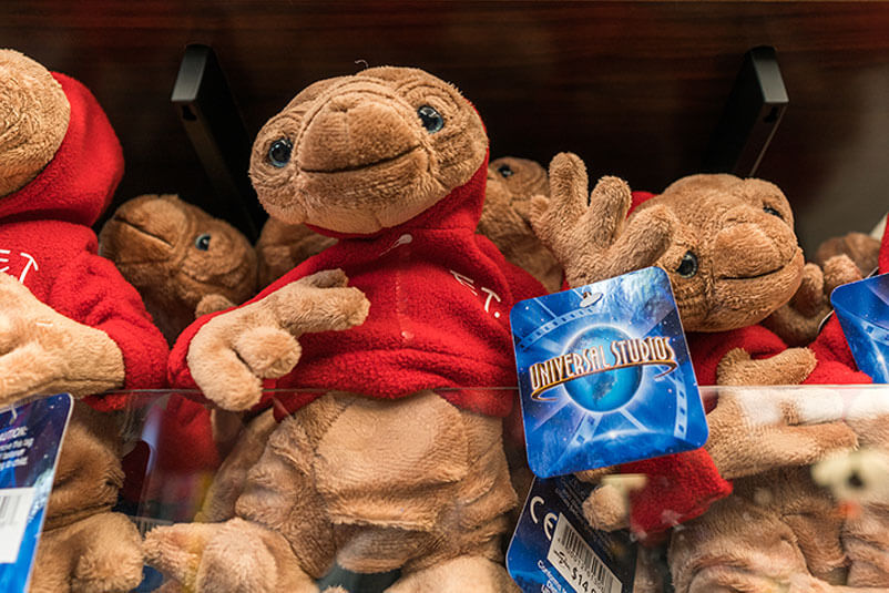 Stuffed ET toys with Universal Studios tags.