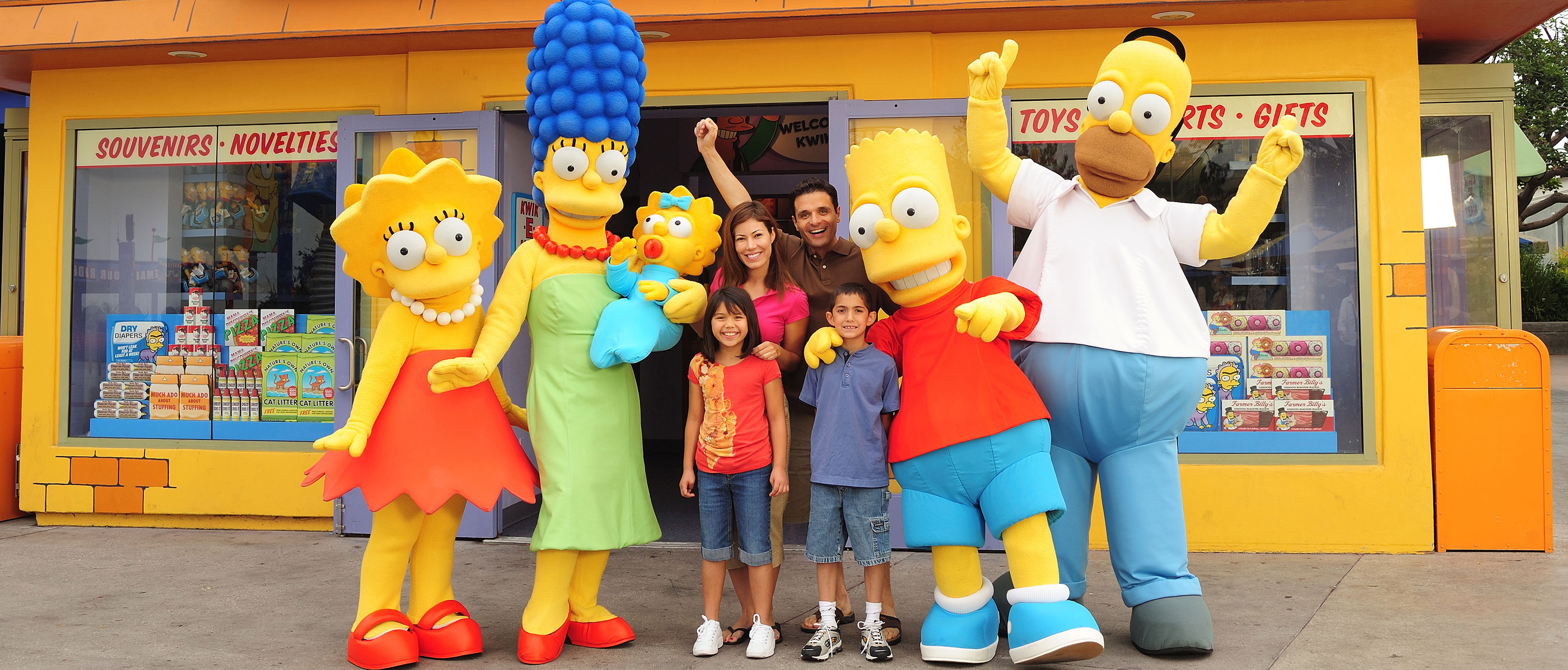 Simpsons taking picture with family