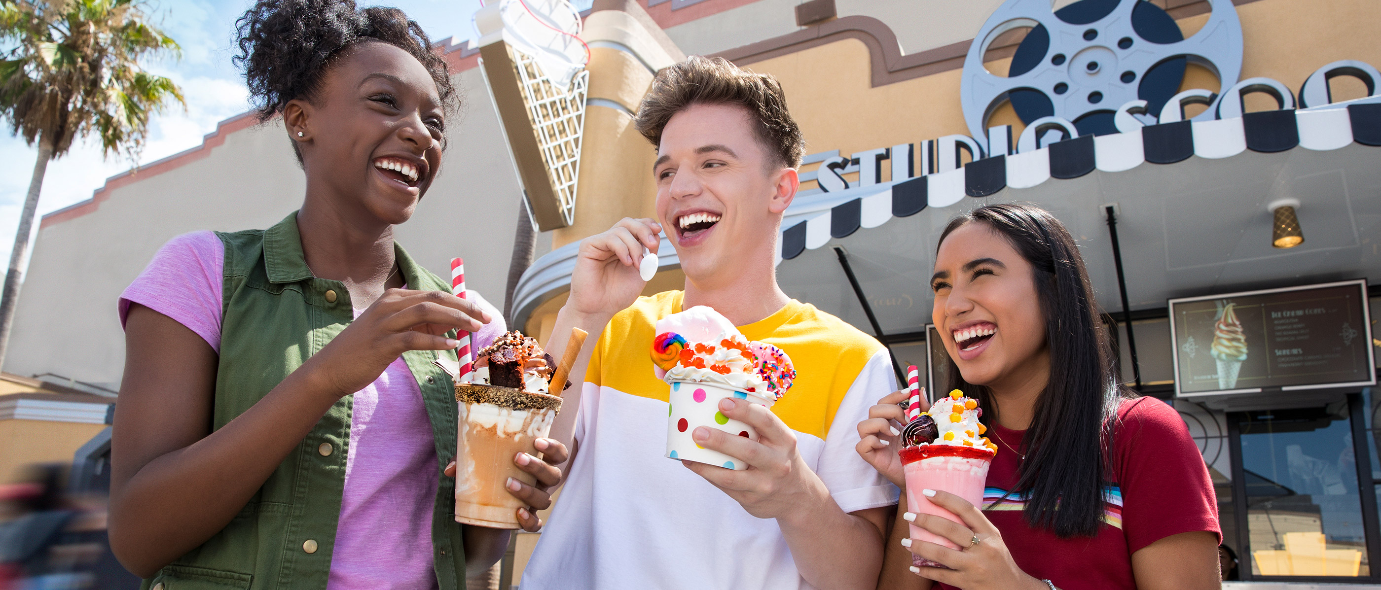 Teens eating Ice Cream creations from Studio Scoop