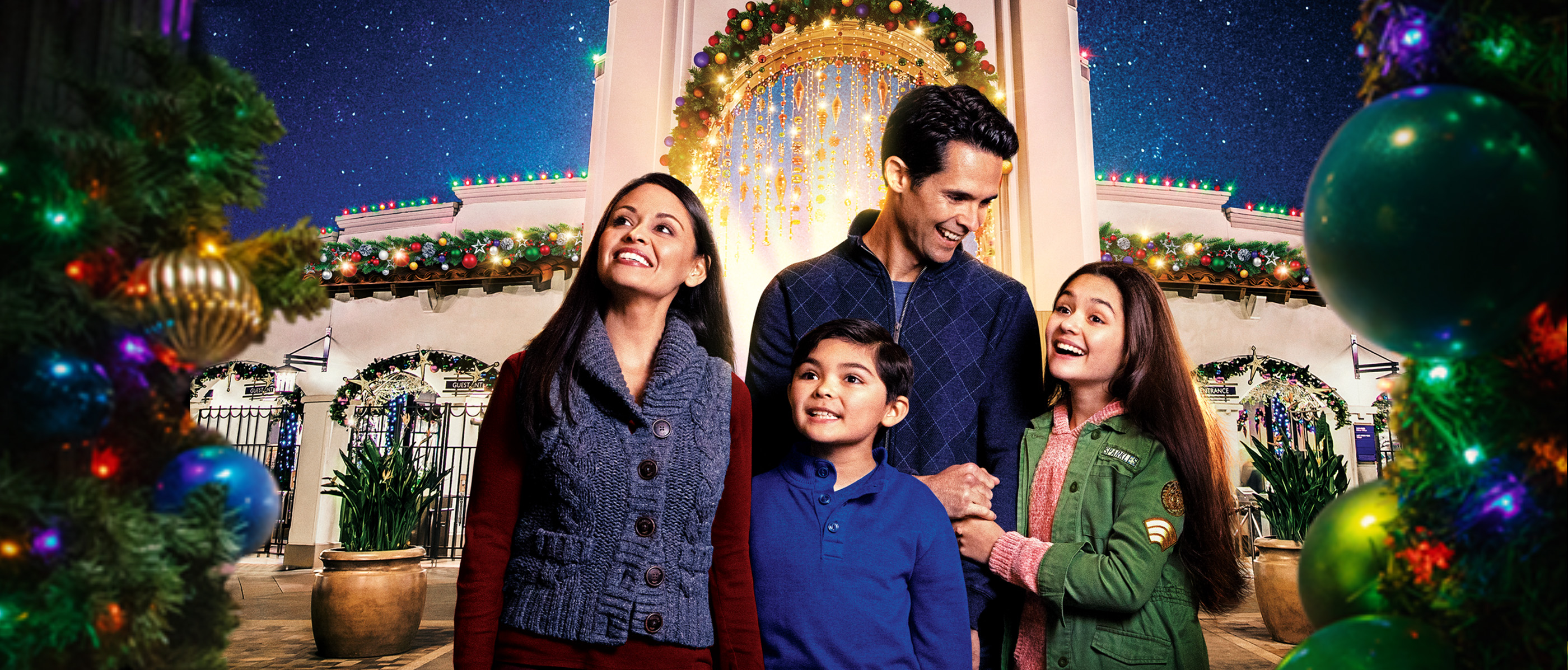 Family in front of Universal Studios Hollywood Arch